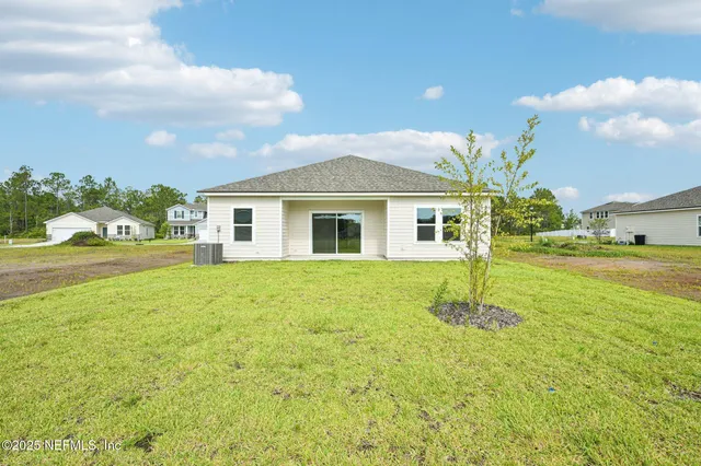 a house view with a garden space