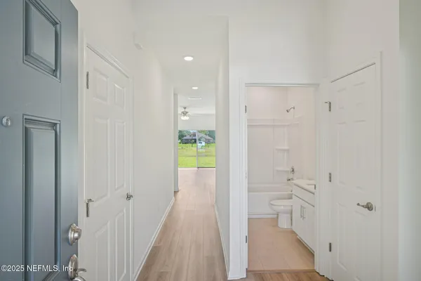 a bathroom with a sink and a shower