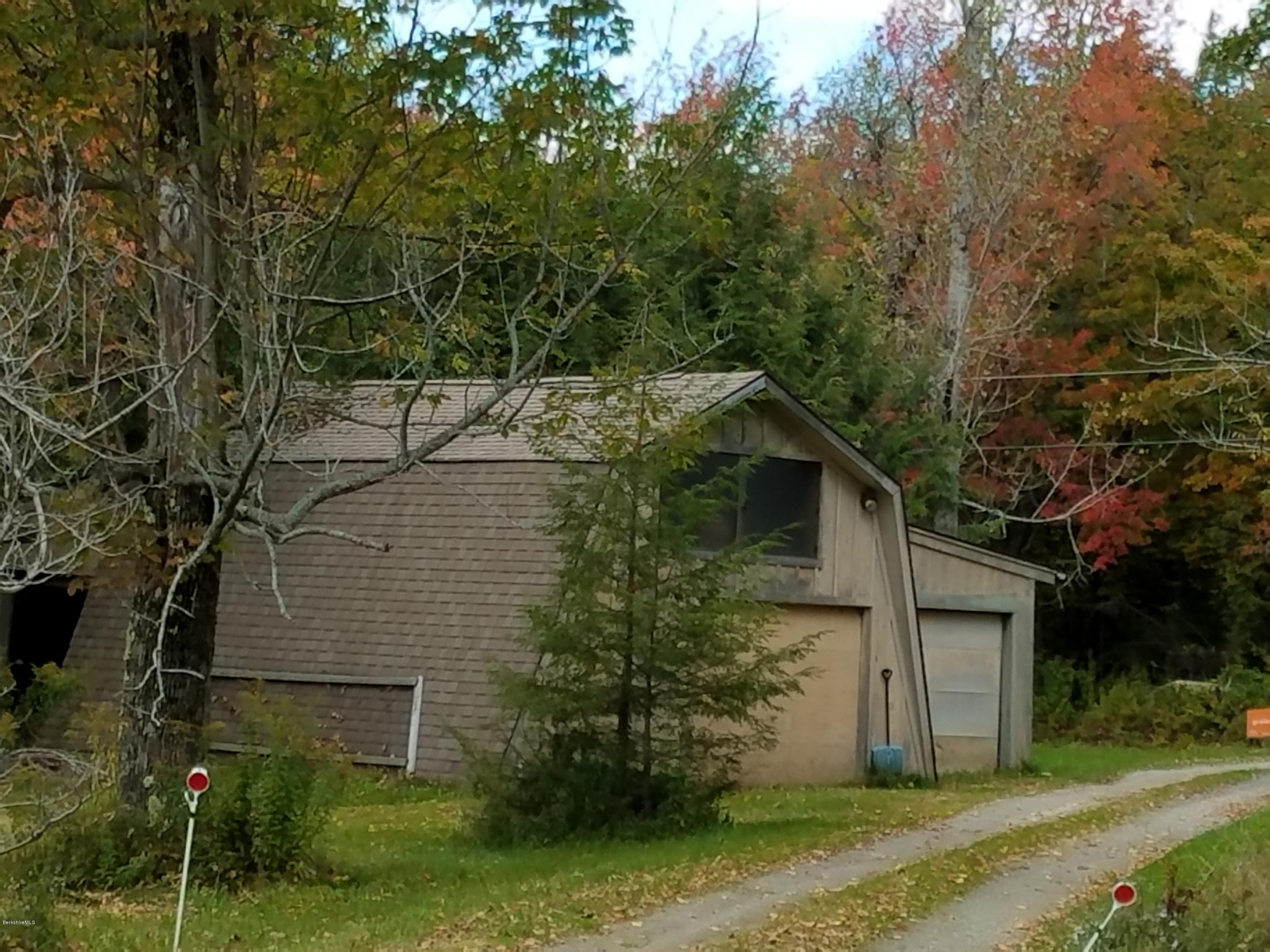 390 Bates Road Windsor, MA 01270 - Photo 50 of 73 a view of a house with a yard