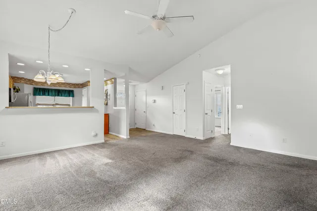 a view of a kitchen with a sink and a window