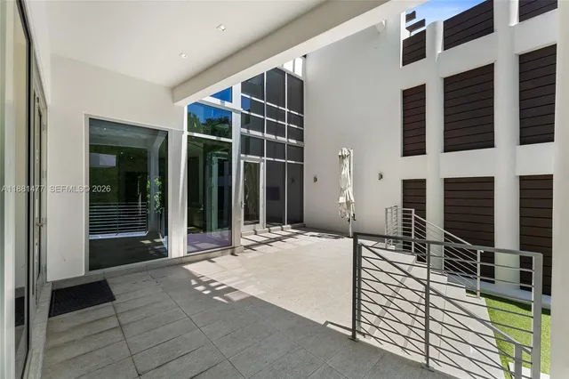 a view of a house with entryway and windows