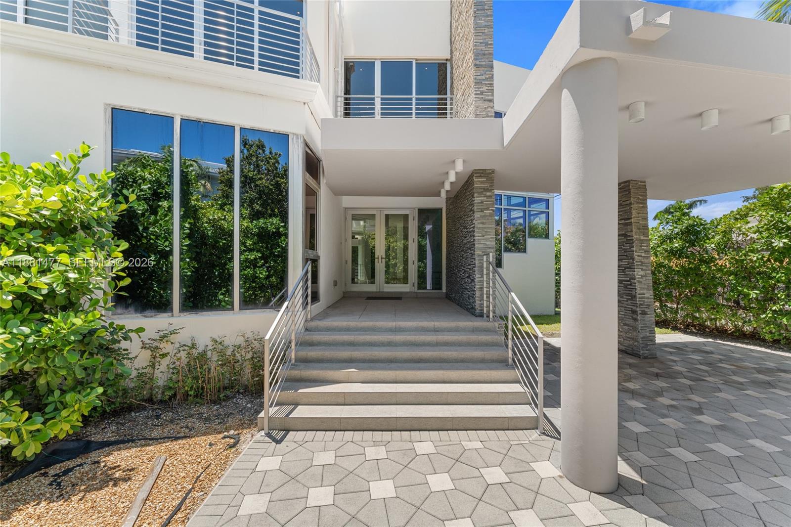 544 Fernwood Road, Unit 544 Key Biscayne, FL 33149 - Photo 16 of 35 a view of a house with entryway and windows