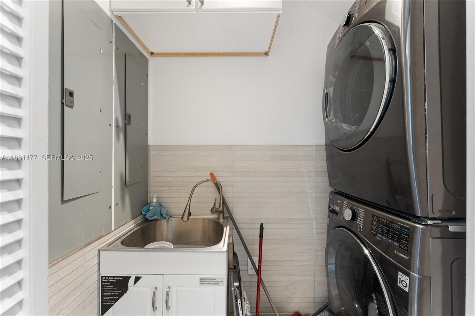 544 Fernwood Road, Unit 544 Key Biscayne, FL 33149 - Photo 17 of 42 a bathroom with a sink a toilet and mirror