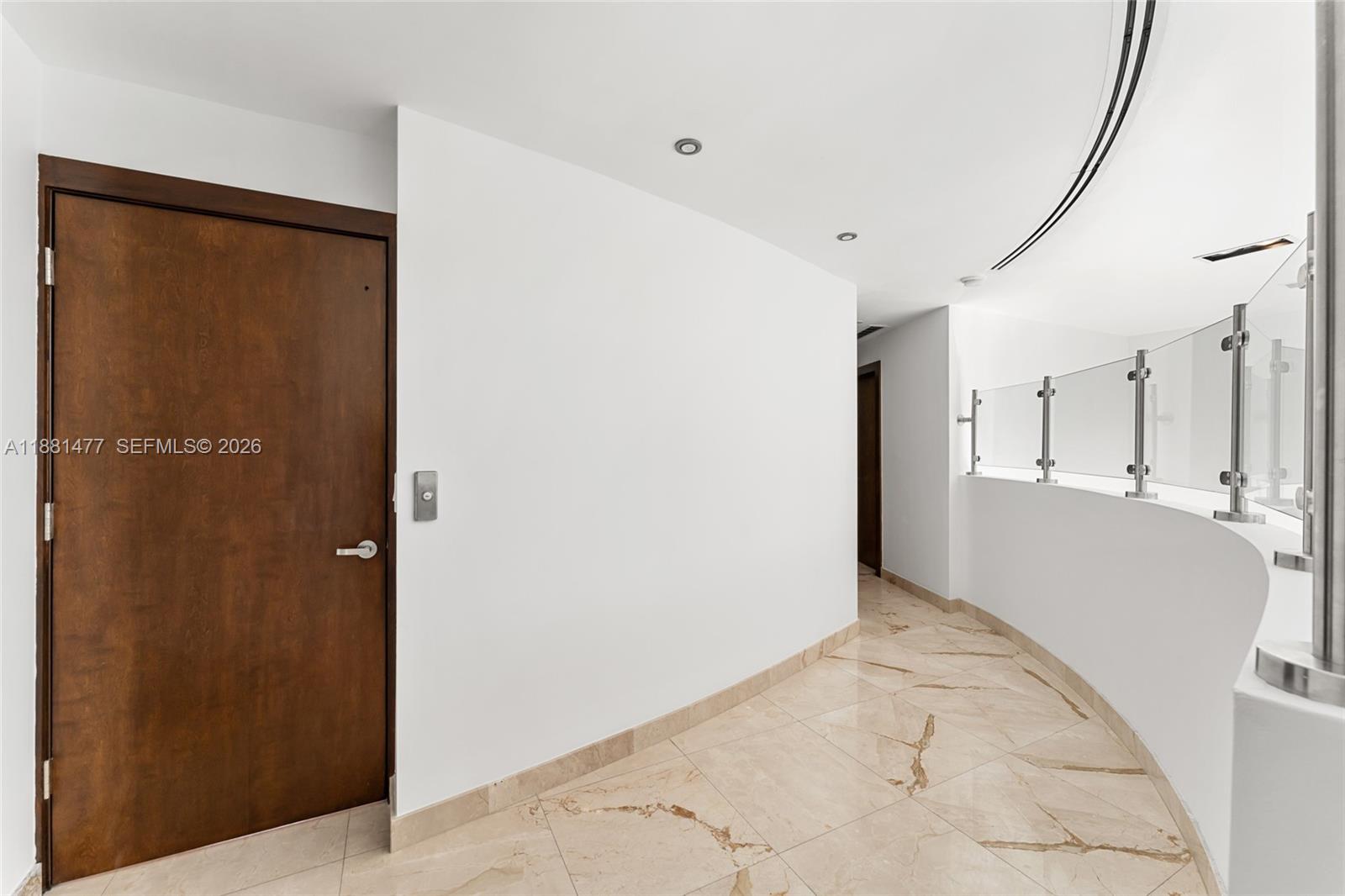 544 Fernwood Road, Unit 544 Key Biscayne, FL 33149 - Photo 24 of 35 a view of a big room with closet and windows