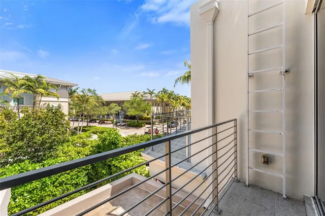 a view of a big room with closet and windows