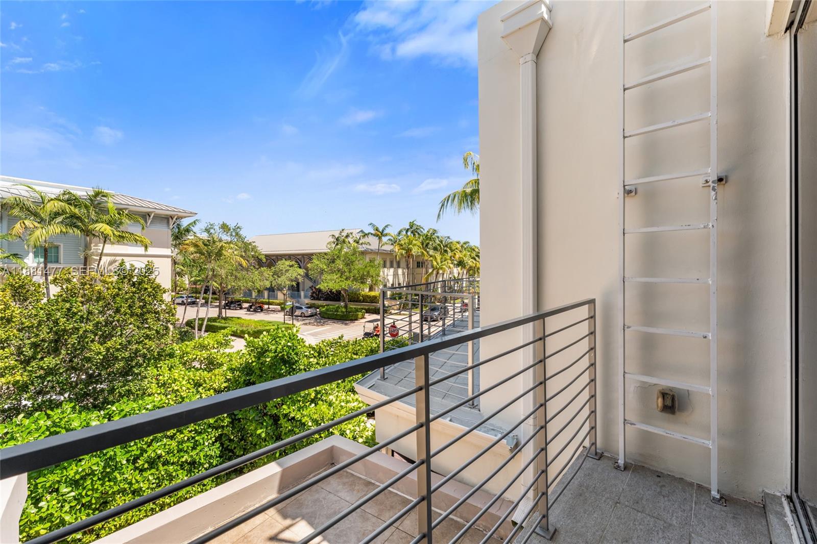 544 Fernwood Road, Unit 544 Key Biscayne, FL 33149 - Photo 24 of 42 a view of city from a balcony