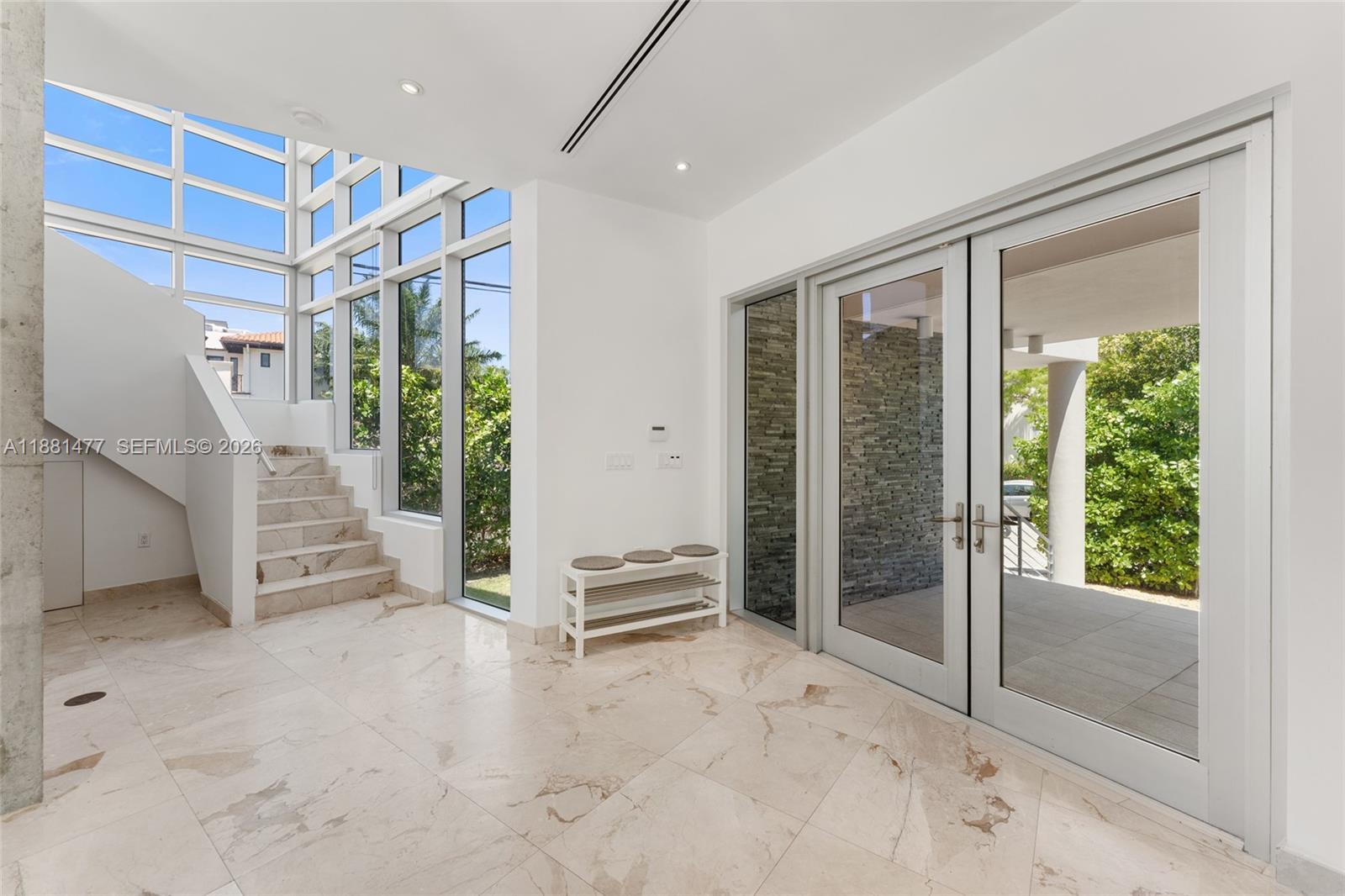 544 Fernwood Road, Unit 544 Key Biscayne, FL 33149 - Photo 3 of 35 a view of entryway with stairs