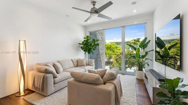 a view of a chair and tables in the patio area
