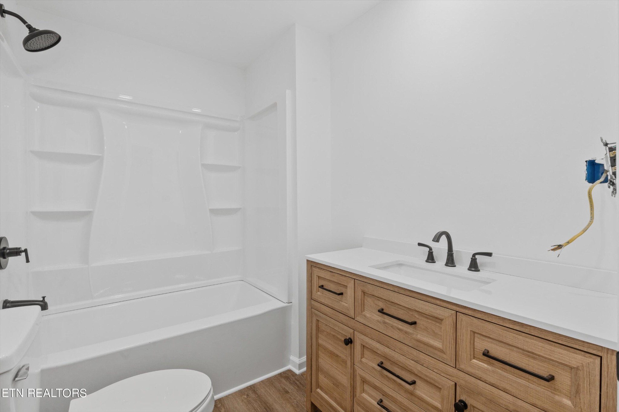 2399 Sweetwater Vonore Road Sweetwater, TN 37874 - Photo 15 of 26 a bathroom with a sink toilet and bathtub