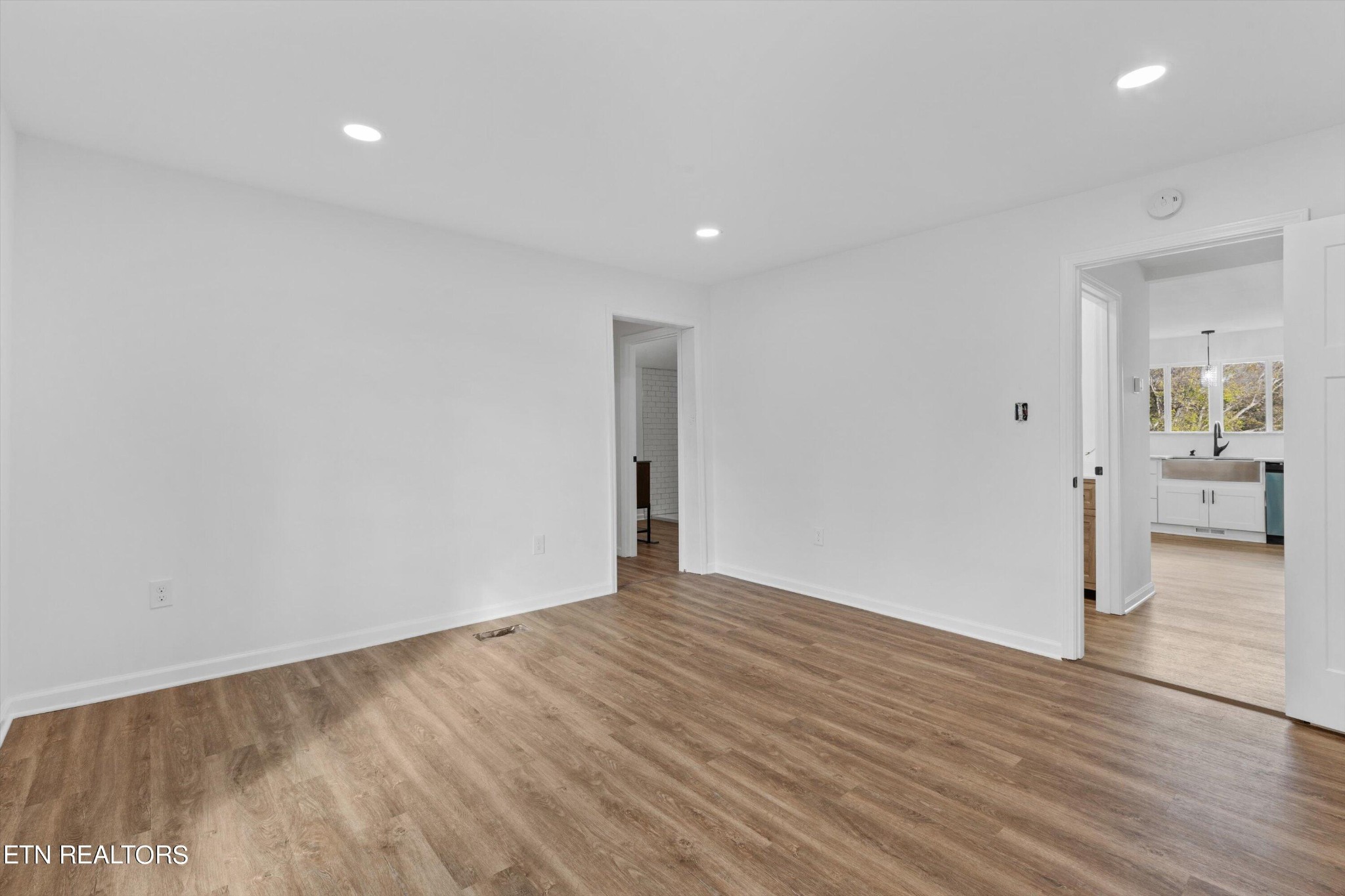 2399 Sweetwater Vonore Road Sweetwater, TN 37874 - Photo 17 of 26 a view of an empty room with wooden floor