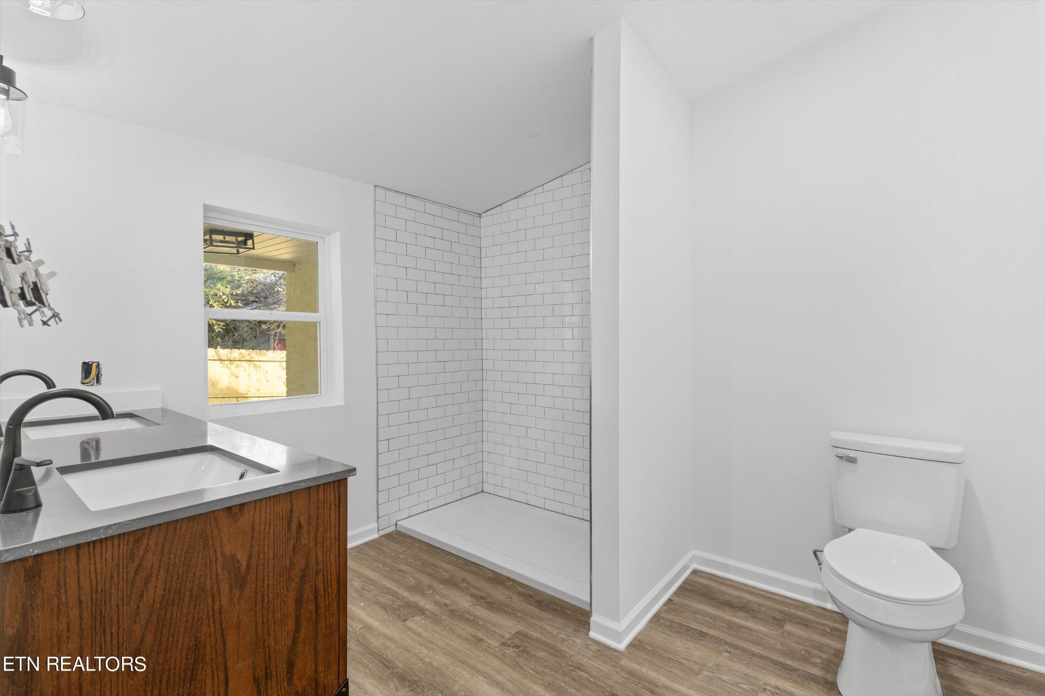 2399 Sweetwater Vonore Road Sweetwater, TN 37874 - Photo 20 of 26 a bathroom with a sink toilet and shower