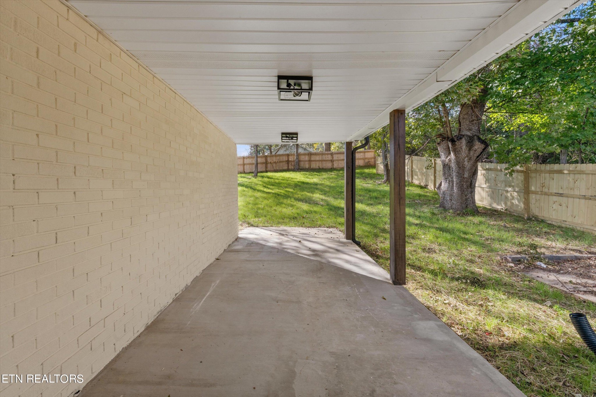 2399 Sweetwater Vonore Road Sweetwater, TN 37874 - Photo 22 of 26 a view of a yard with wooden fence