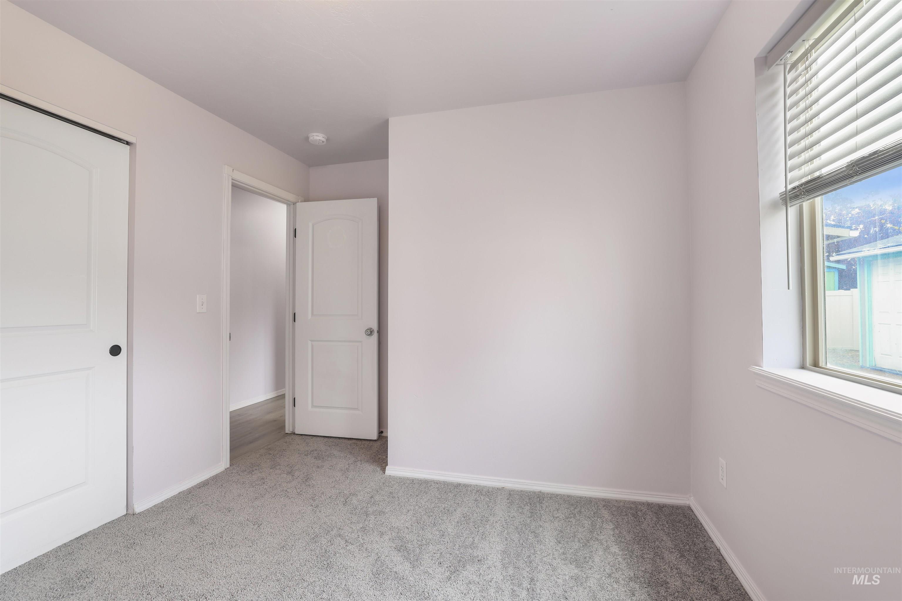 356 Watchmaker Street Twin Falls, ID 83301 - Photo 16 of 22 Unfurnished bedroom featuring light colored carpet and a closet