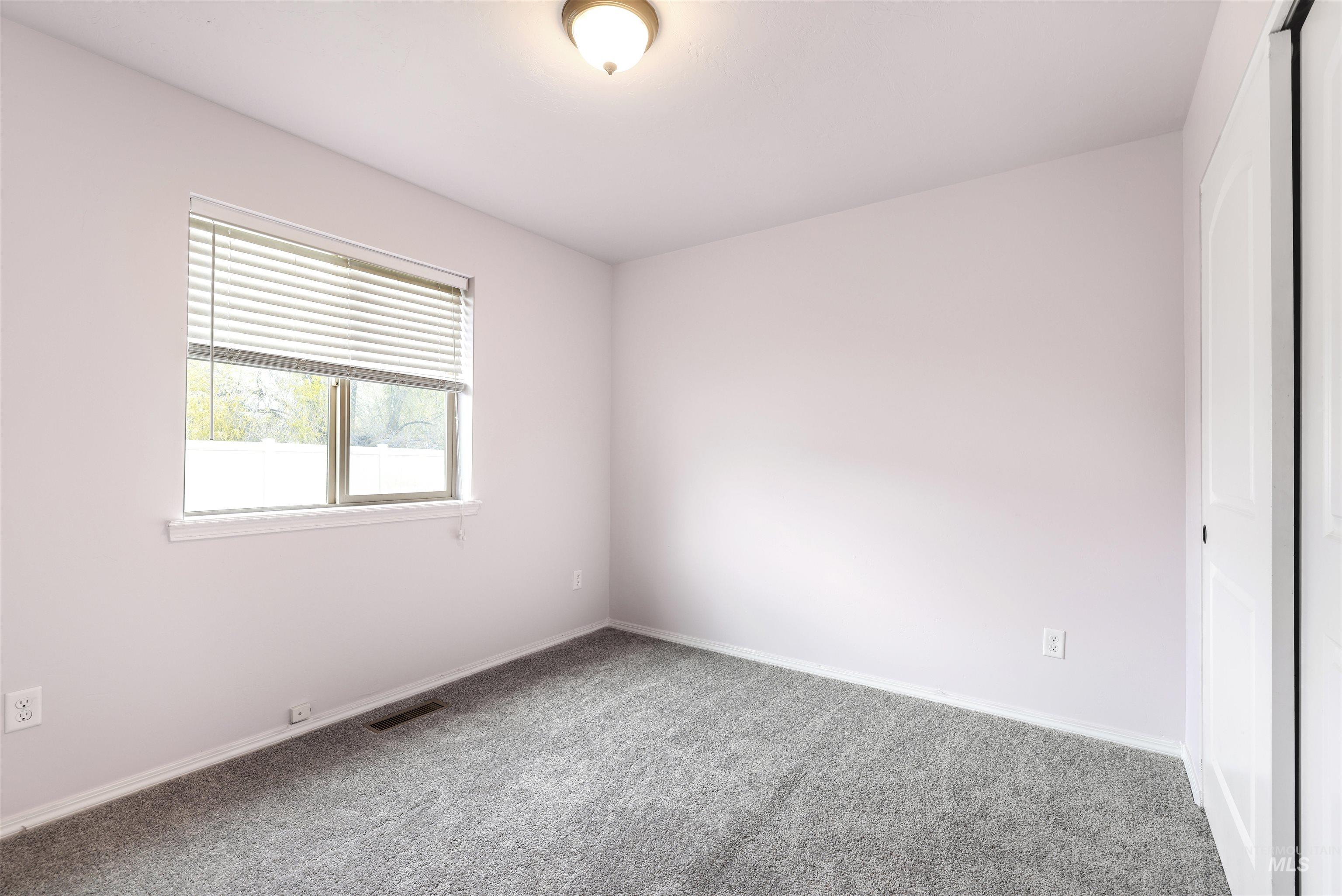 356 Watchmaker Street Twin Falls, ID 83301 - Photo 17 of 22 Spare room with carpet flooring and baseboards