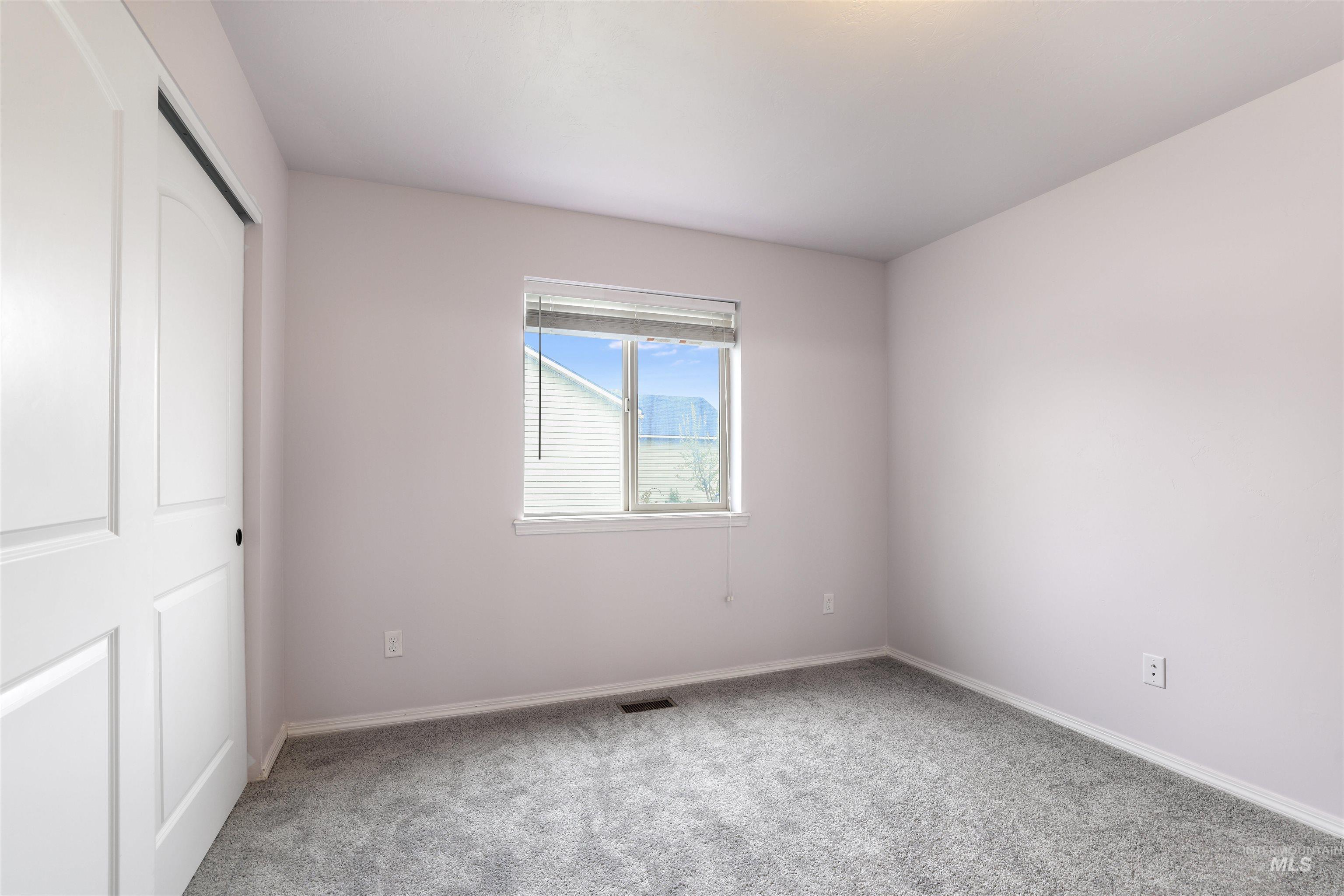 356 Watchmaker Street Twin Falls, ID 83301 - Photo 18 of 22 Unfurnished bedroom featuring a closet and light carpet