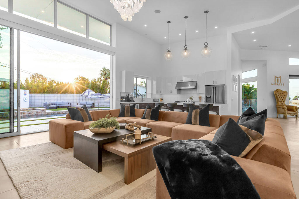 2100 East Sahara Road Palm Springs, CA 92262 - Photo 113 of 117 a living room with furniture and a large window