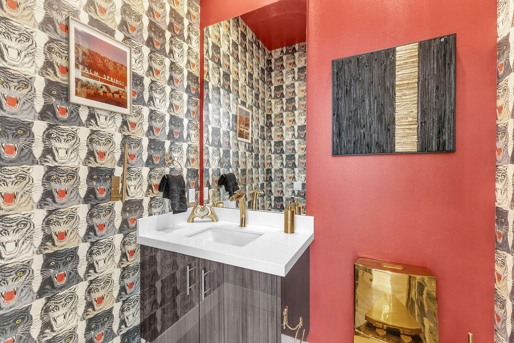 2100 East Sahara Road Palm Springs, CA 92262 - Photo 18 of 117 a bathroom with a sink and a mirror