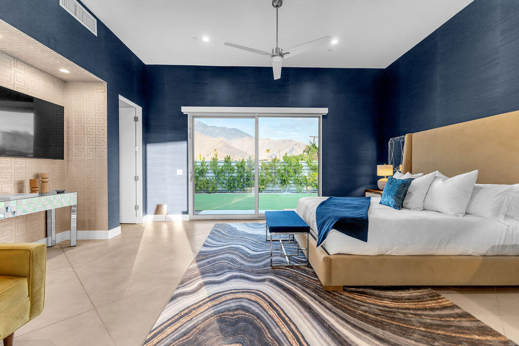 2100 East Sahara Road Palm Springs, CA 92262 - Photo 5 of 117 a living room with furniture and a large window