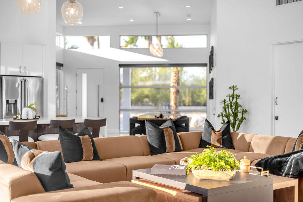 2100 East Sahara Road Palm Springs, CA 92262 - Photo 60 of 117 a living room with furniture and a large window