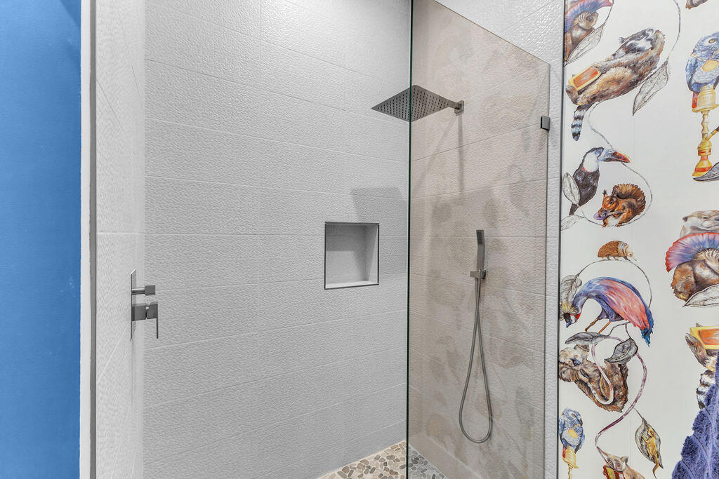 2100 East Sahara Road Palm Springs, CA 92262 - Photo 10 of 117 a bathroom with a shower and a shower curtain