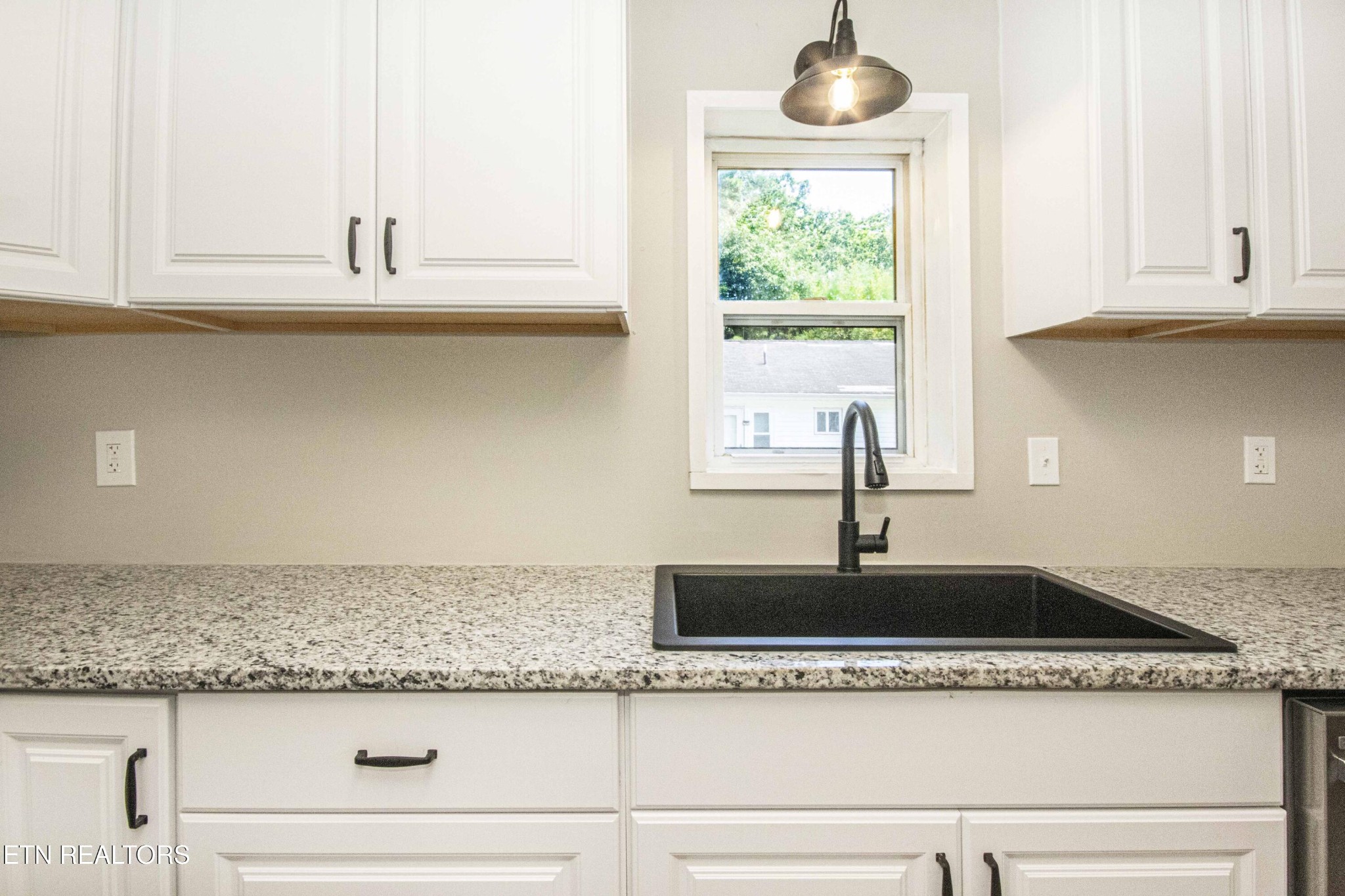 110 Delmar Circle Oak Ridge, TN 37830 - Photo 15 of 38 a kitchen with a sink and cabinets