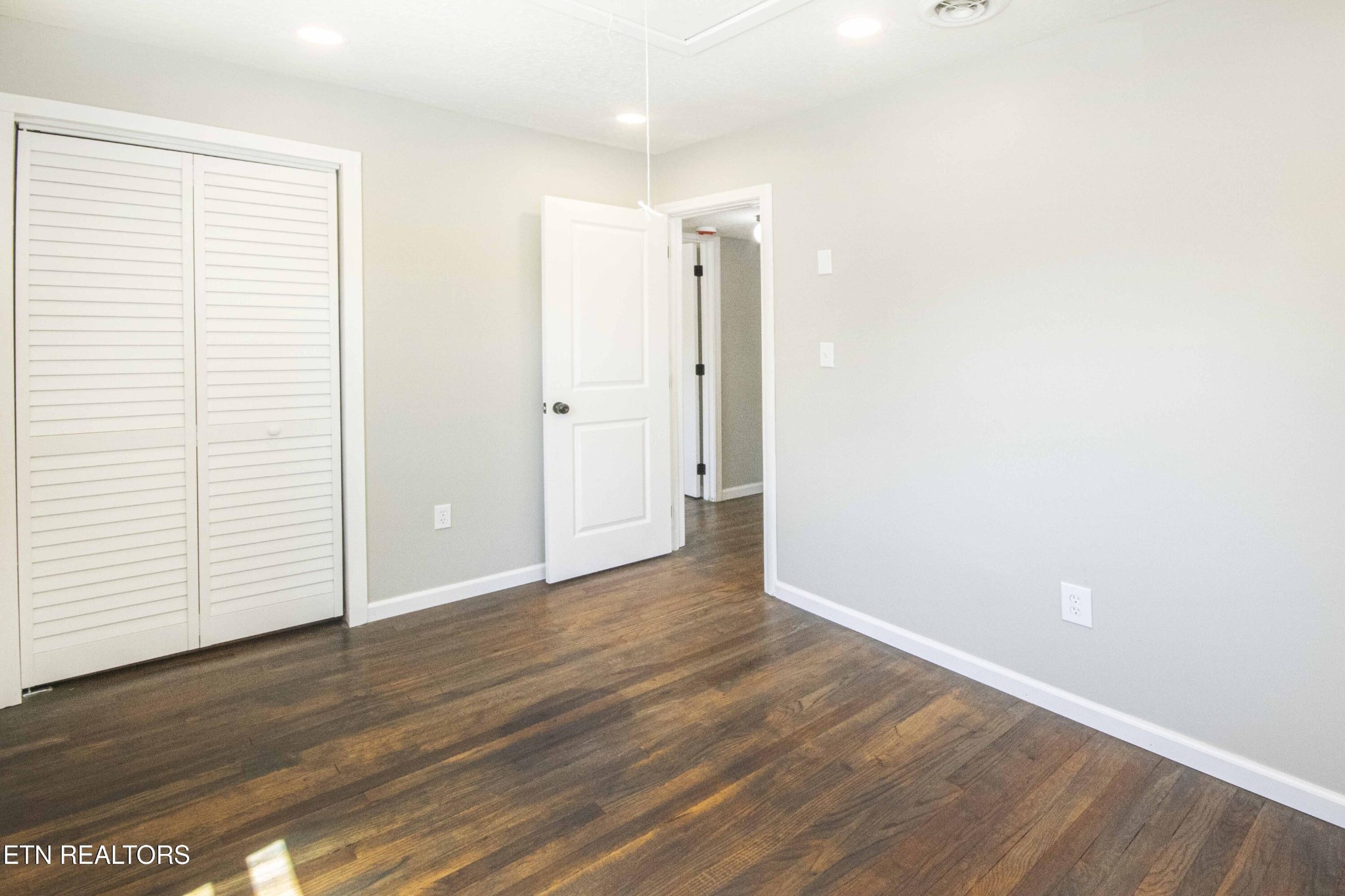 110 Delmar Circle Oak Ridge, TN 37830 - Photo 17 of 38 a view of an empty room with wooden floor