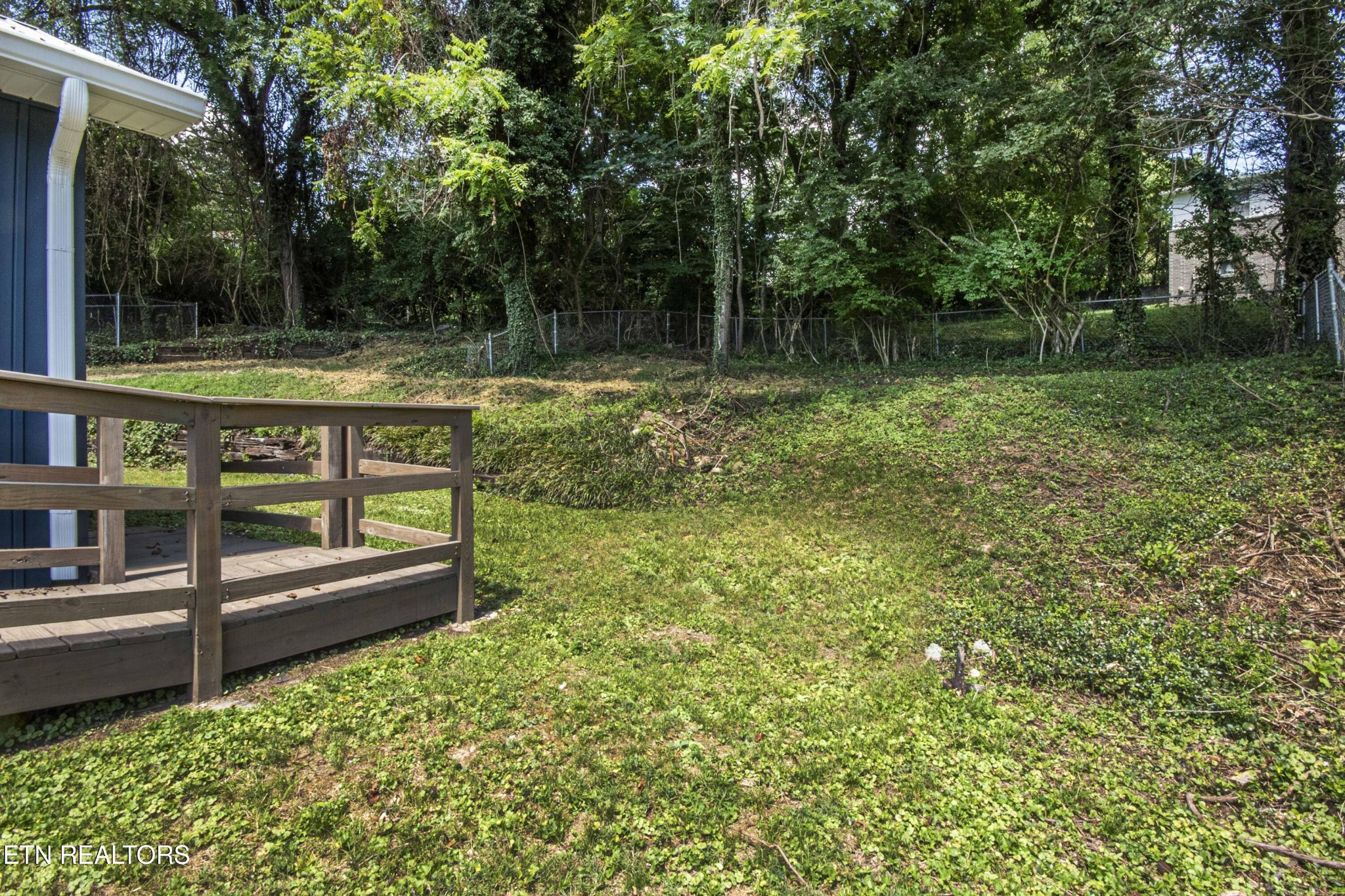 110 Delmar Circle Oak Ridge, TN 37830 - Photo 34 of 38 a view of a wooden deck with a yard