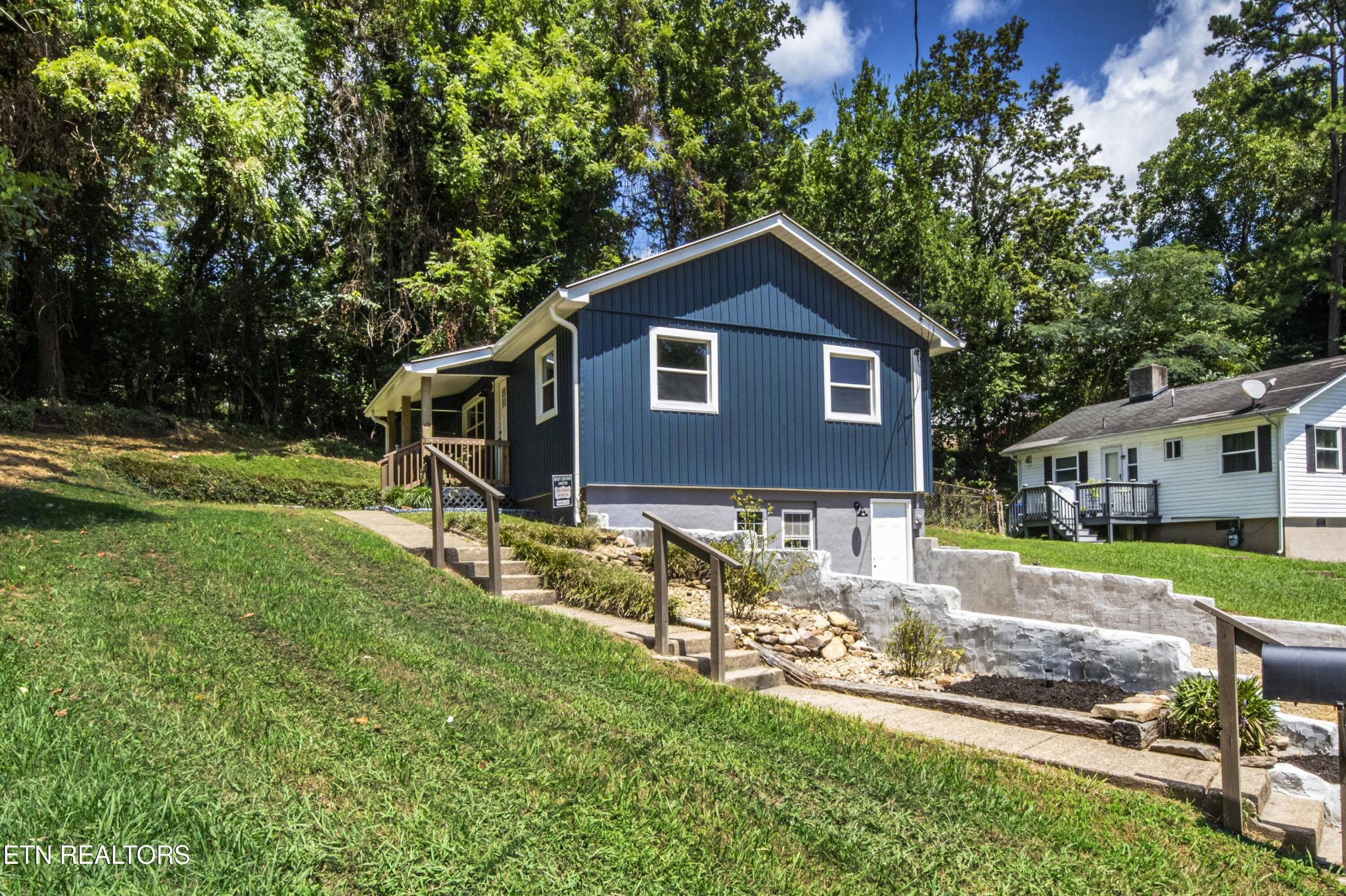 110 Delmar Circle Oak Ridge, TN 37830 - Photo 37 of 38 a view of a yard in front of a house with large tree