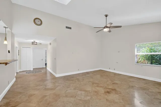 a view of a kitchen with a sink and dishwasher cabinet