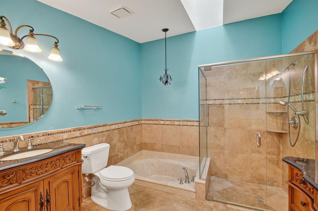 1620 Northwest 22nd Avenue Delray Beach, FL 33445 - Photo 23 of 63 a bathroom with a shower a toilet and sink