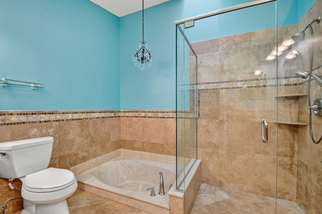 1620 Northwest 22nd Avenue Delray Beach, FL 33445 - Photo 27 of 63 a bathroom with a shower and a toilet