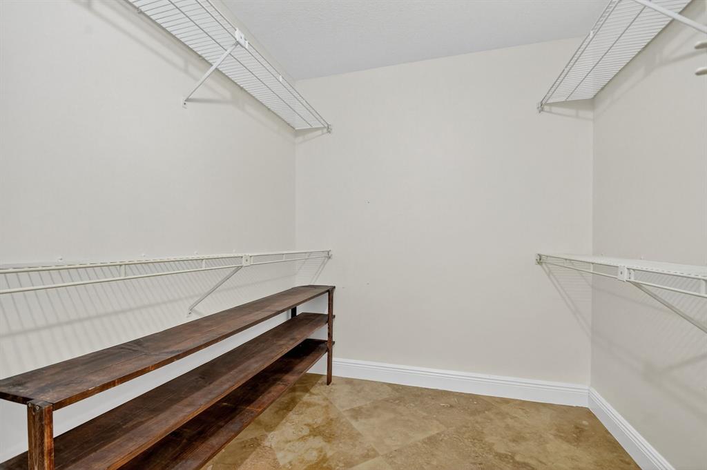 1620 Northwest 22nd Avenue Delray Beach, FL 33445 - Photo 28 of 63 a view of small space with racks on the wall