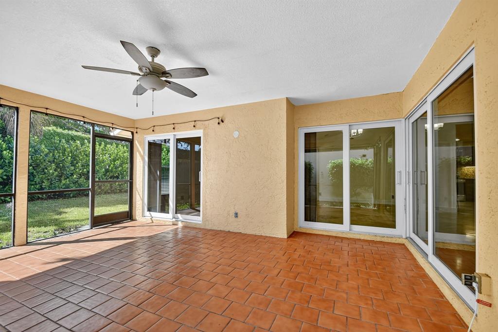 1620 Northwest 22nd Avenue Delray Beach, FL 33445 - Photo 32 of 63 a view of an empty room with glass door