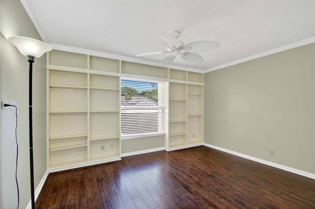 1620 Northwest 22nd Avenue Delray Beach, FL 33445 - Photo 34 of 63 an empty room with wooden floor and closet