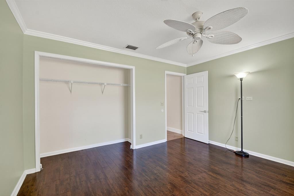 1620 Northwest 22nd Avenue Delray Beach, FL 33445 - Photo 36 of 63 a view of an empty room with wooden floor