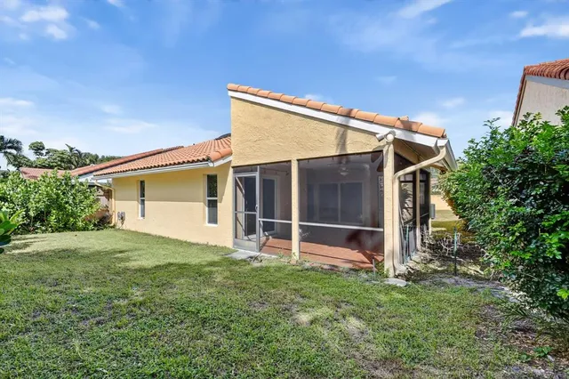 a view of a swimming pool with a lounge chairs