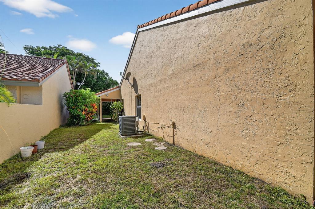 1620 Northwest 22nd Avenue Delray Beach, FL 33445 - Photo 46 of 63 a view of a back yard of the house