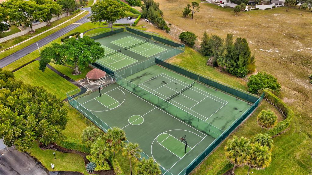 1620 Northwest 22nd Avenue Delray Beach, FL 33445 - Photo 50 of 63 a view of a tennis court