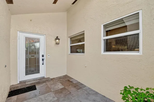 a view of a storage & utility room with a sink