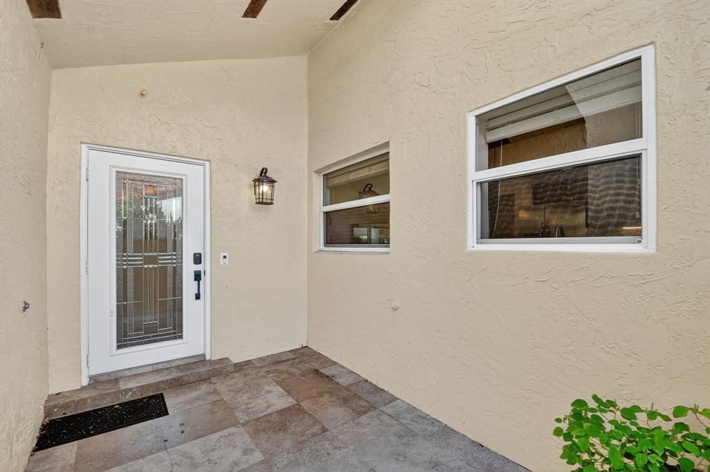 1620 Northwest 22nd Avenue Delray Beach, FL 33445 - Photo 5 of 63 a view of an empty room with window