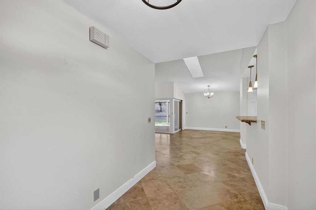 1620 Northwest 22nd Avenue Delray Beach, FL 33445 - Photo 6 of 63 a view of a storage & utility room with a sink