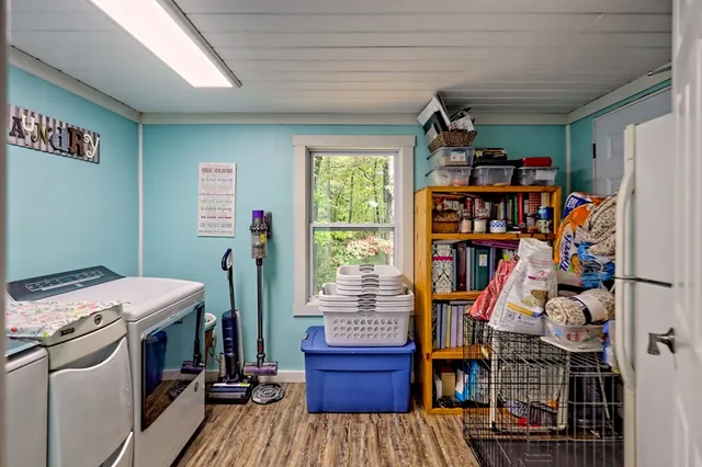 a kitchen with granite countertop a sink and a stove top oven