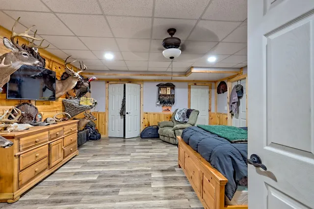 a living room with furniture flat screen tv and a fireplace