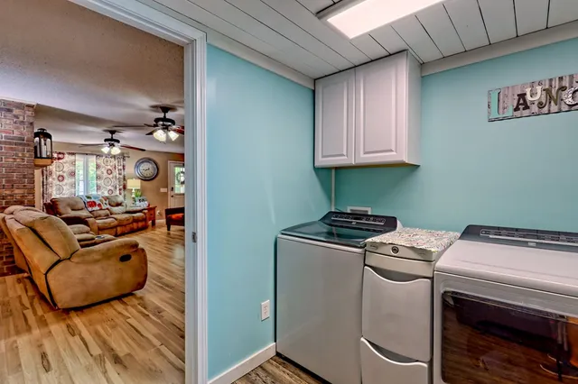 a view of a storage & utility room with washer and dryer