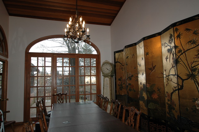 1551 Edgewood Road Lake Forest, IL 60045 - Photo 4 of 6 a view of a porch with a table and chairs