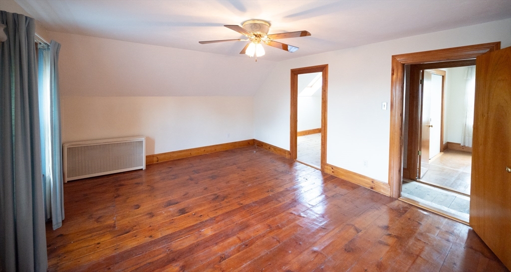 4 Winter Street Clinton, MA 01510 - Photo 15 of 33 wooden floor in an empty room with a window