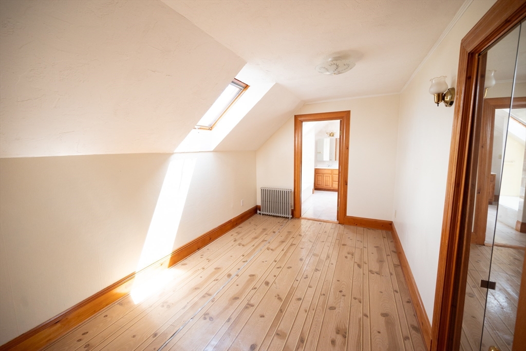 4 Winter Street Clinton, MA 01510 - Photo 16 of 33 a view of an empty room and wooden floor