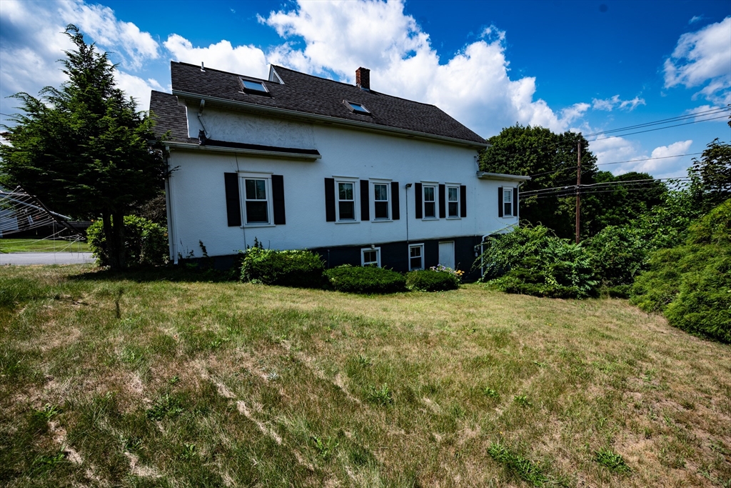 4 Winter Street Clinton, MA 01510 - Photo 3 of 33 a house view with a garden space