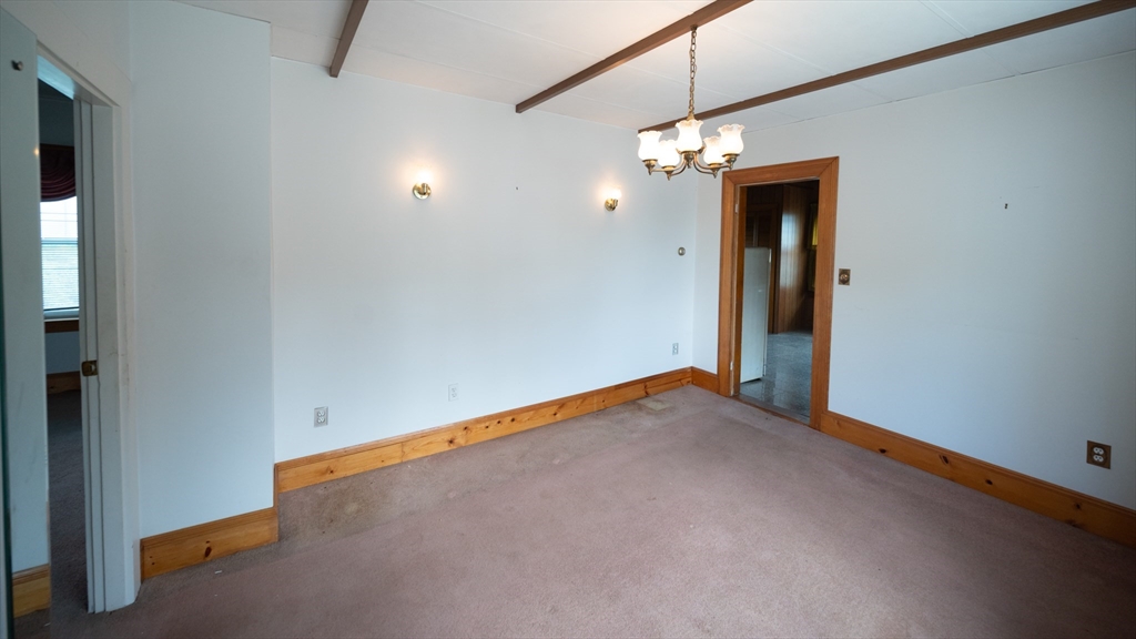 4 Winter Street Clinton, MA 01510 - Photo 6 of 33 a view of an empty room with a window