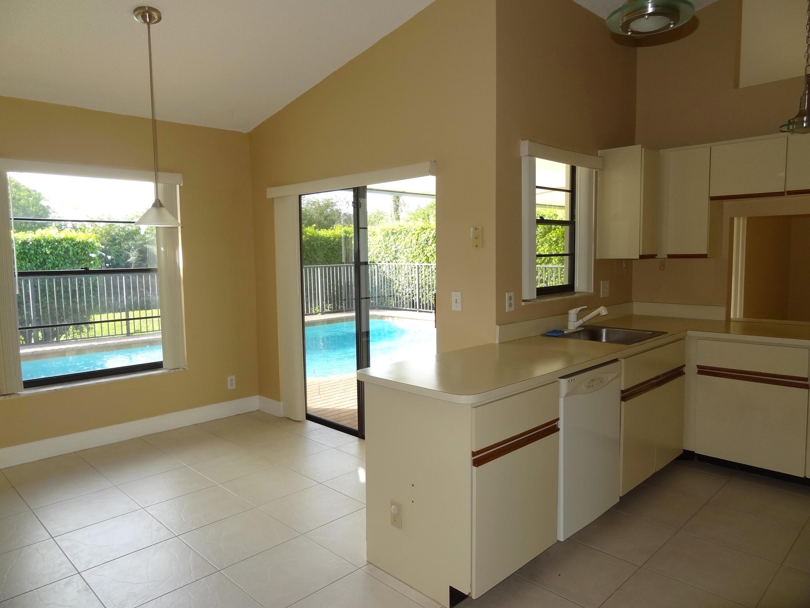 9936 Majorca Place Boca Raton, FL 33434 - Photo 13 of 21 KITCHEN PLUS DINING AREA